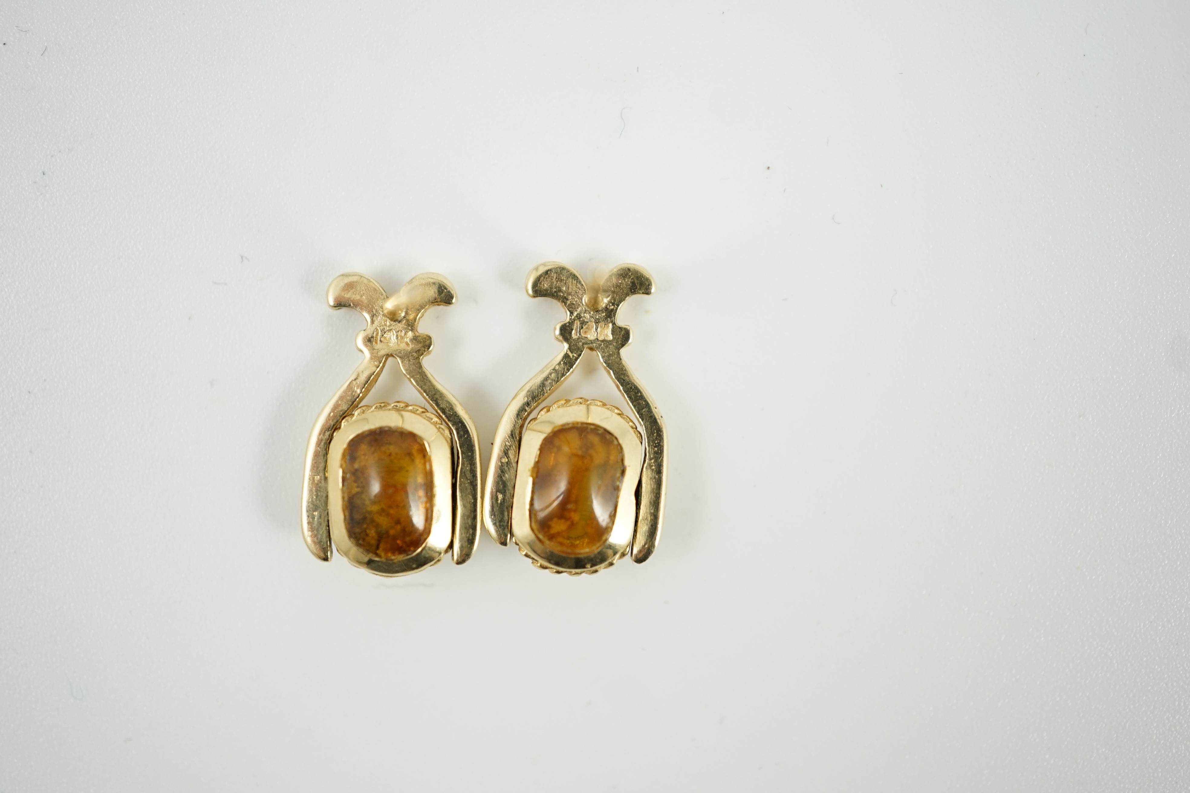 A modern pair of 14k and hardstone? set swivelling earrings, 17mm, gross weight 3 grams.